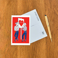 Postcard IO-319 Two Cowboys with Heart Sign