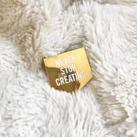 Gold Never Stop Creating Enamel Pin
